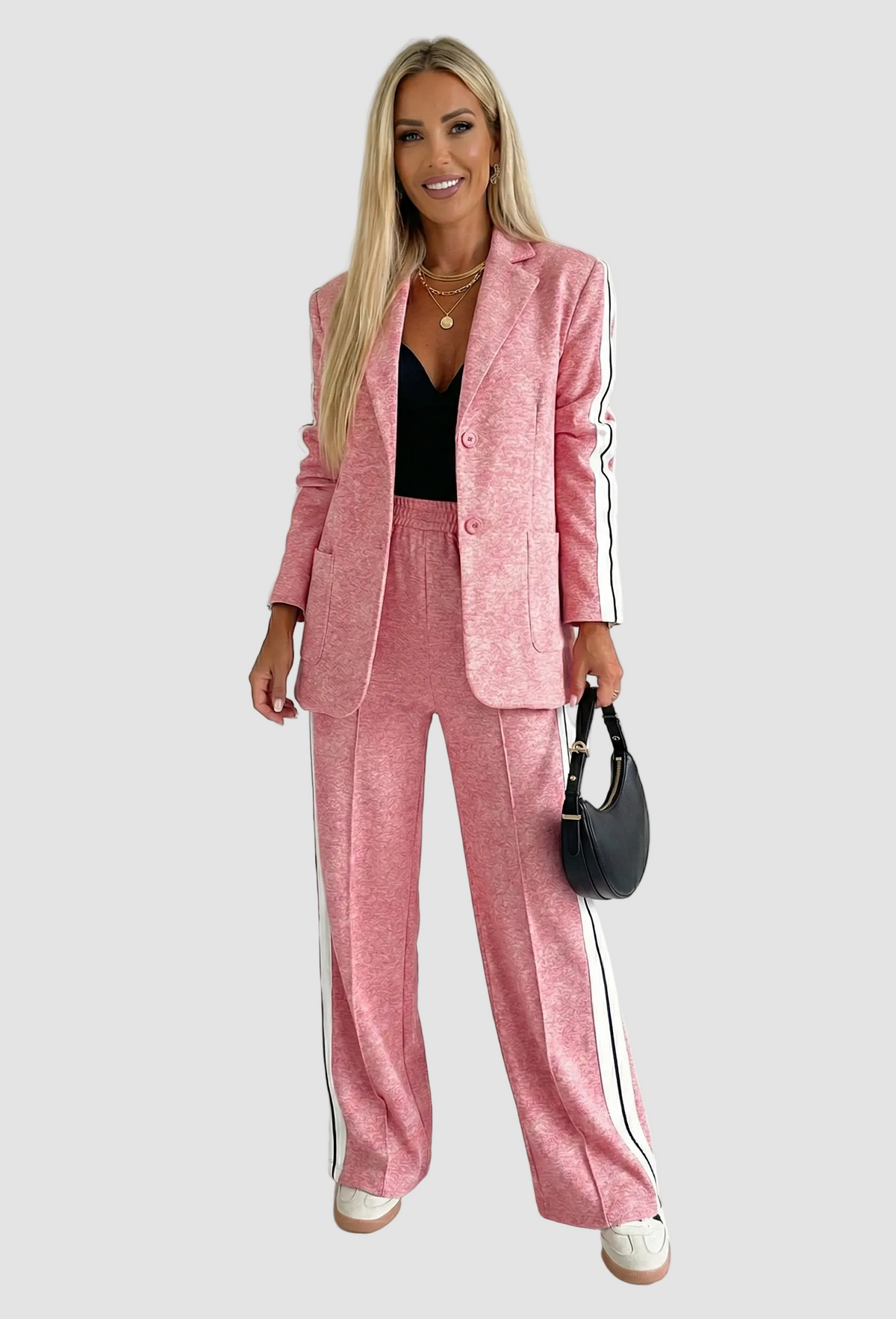 Completo da donna con blazer e pantaloni a righe e gamba larga