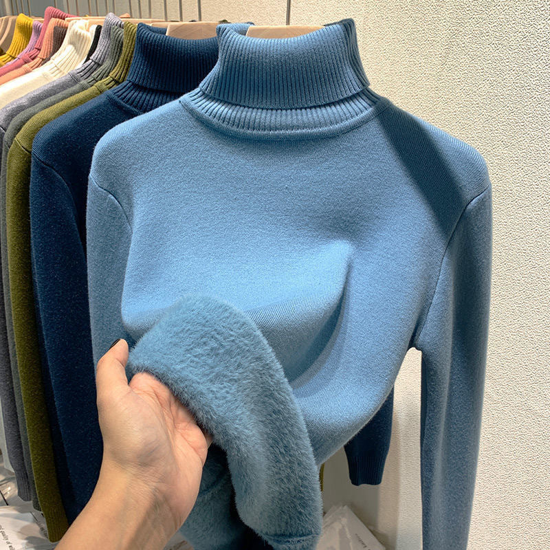 Jersey de punto fino para mujer con cuello alto y ribetes elásticos