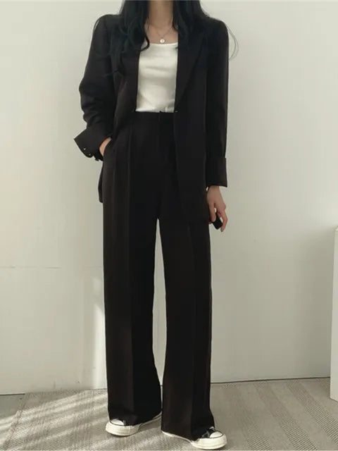 Completo blazer e pantaloni da donna a gamba larga