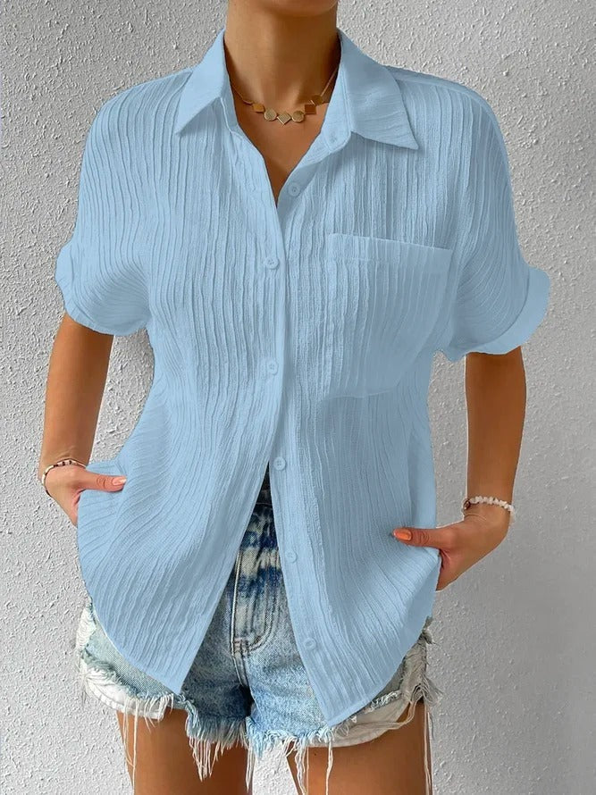 Blusa elegante para mujer con ajuste suelto y bolsillo en el pecho