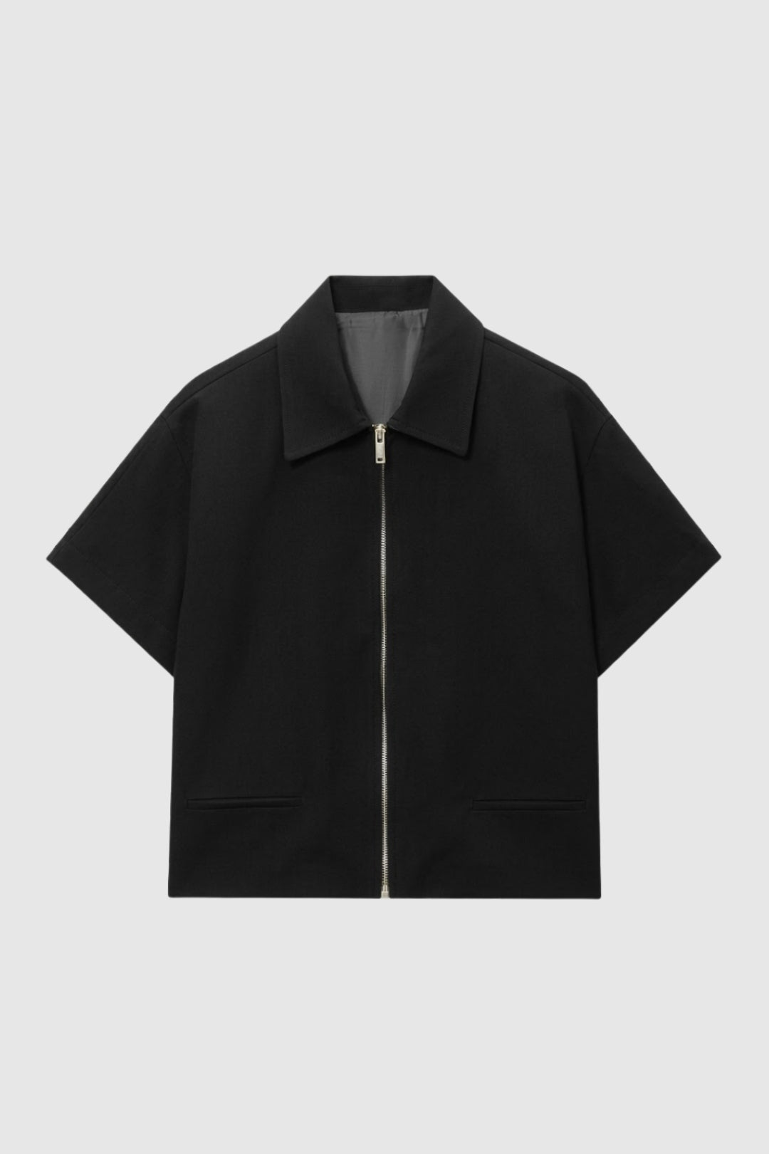 Krátké dámské sako s krátkým zipem, klopami, ležérní a elegantní